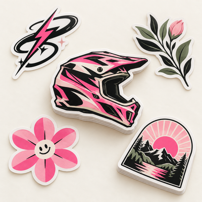 AI-generated illustration: Five original pink, black and sage die-cut sticker designs on a warm white background, including a helmet, lightning loop, flower, botanical sprig and mountain landscape.